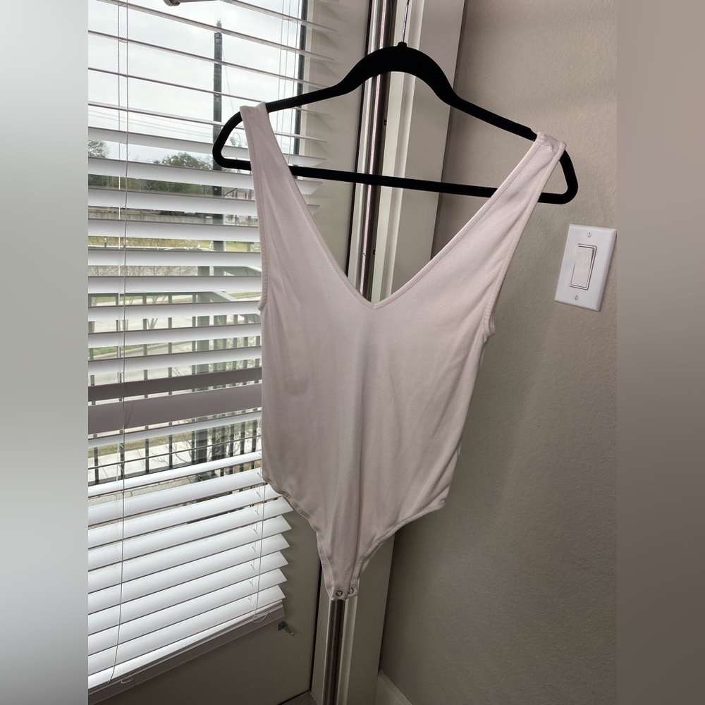 Express x Rocky Barnes white plunge neck body suit